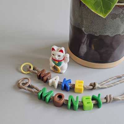 make your own event booth fringe activity Singapore Children's Day kids friendly alphabet bag charm DIY paracord keychain Family Day Product launch
